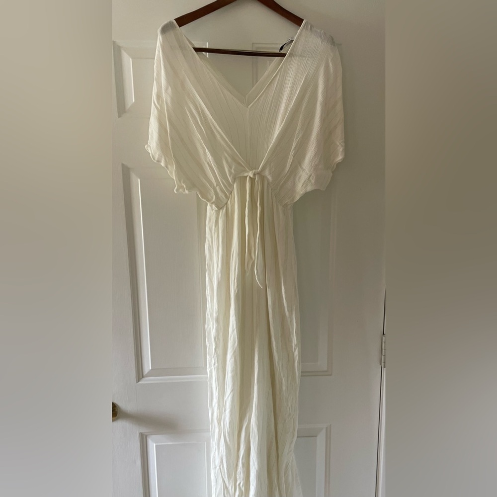 Long chiffon off white dress. Great for summer elegance.
